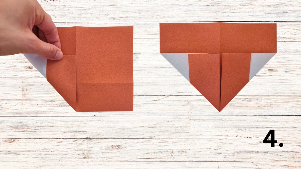 Schritt 4: Ecken zur Mitte falten